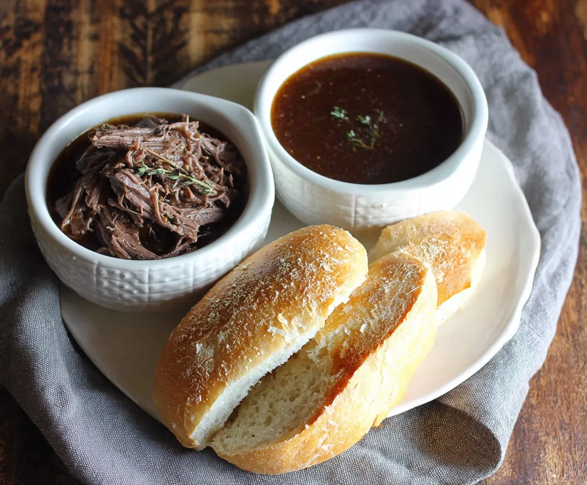 Delicious 5 Ingredient Beef Dip served with fresh vegetables on a white platter.
